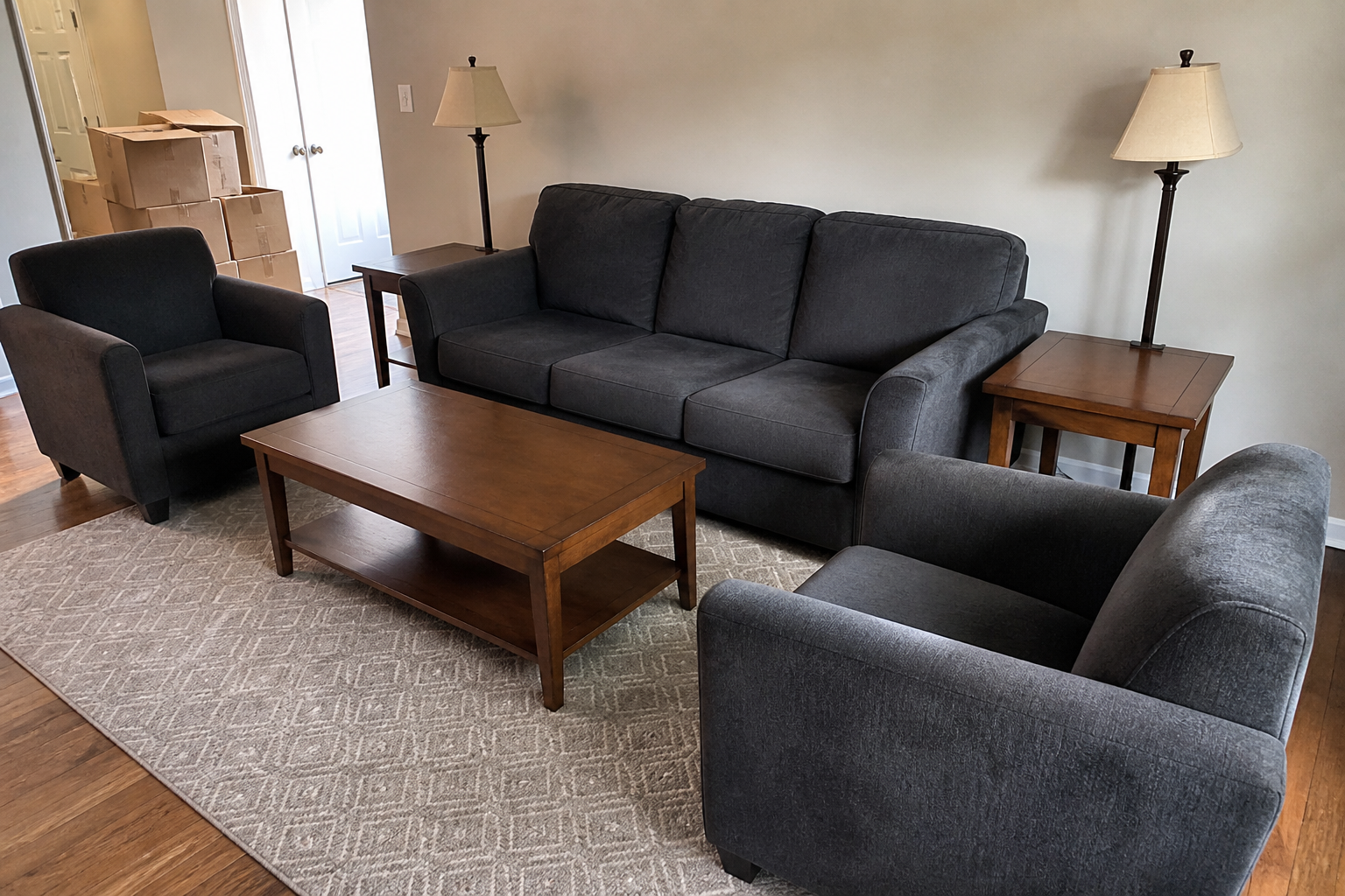 Fictional seller photo of a sofa, two chairs, tables, and lamps